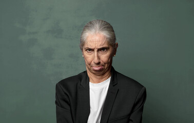 Fototapeta premium feeling stressed, unhappy and frustrated, touching forehead and suffering migraine of severe headache