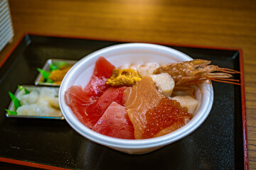 Aomori Gyosai Center fish market, Sashimi seafood, Aomori Nokke don with salmon, akami, chutoro, otoro, octopus, sweet shrimp or uni. local japanese food. freshness meal, travel destination.