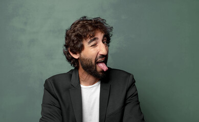  with cheerful, carefree, rebellious attitude, joking and sticking tongue out, having fun
