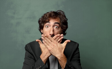  covering mouth with hands with a shocked, surprised expression, keeping a secret or saying oops