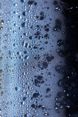 CLose Up of Condensation Bubbles and Marks on A Window Water Background