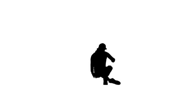 Silhouette man dancing Northern Soul Floor Dance in loop on floor with white background, dance for compositing and presentation, dancing man breakdancing on floor, hip hop dancer practicing dance