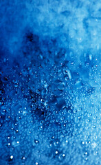 CLose Up of Condensation Bubbles and Marks on A Window Water Background