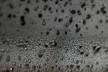 CLose Up of Condensation Bubbles and Marks on A Window Water Background