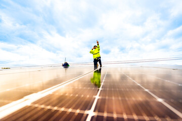 close up on grid of technology renewable solar energy. construction solar panels system on roof....