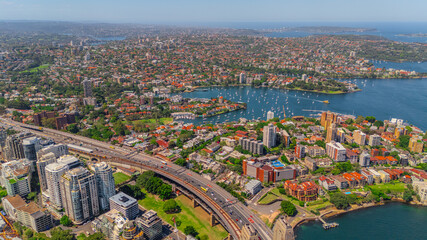 Aerial View of Sydney Harbour Balmain Darling harbour Sydney CBD cockle Bay Wharf North Sydney harbour bridge Lavender Bay Milsons Point Manly on a warm summer day blue skies 