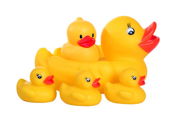 A group of rubber ducks are sitting in a row, with the largest one being yellow and the others being smaller