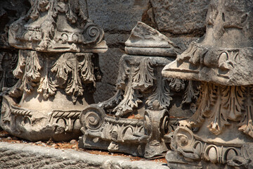 Base detail of hellenistic columns at the ancient city of Ephesus in bright sunlight.