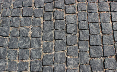 Square granite paving stones texture background
