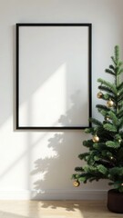 picture frame is hanging on a wall next to a lovely christmas tree