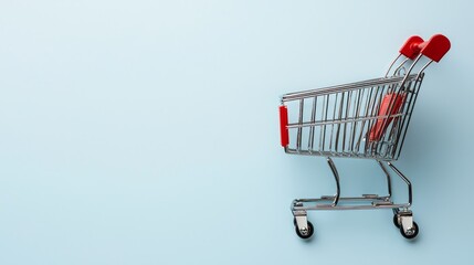  a shopping cart with a red handle on a blue background