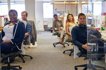 Office, business people and coworking in portrait by cubicle, ambitious and about us for insurance company. Collaboration, employees and smile in workplace for consulting, professional career or team