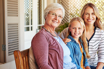 Women, family and portrait of generations with mother, grandmother and child together on patio. Backyard, smile and bonding with love, care and trust with grandma and thanksgiving reunion at home