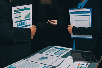 Business people are analyzing and planning business strategies.