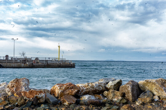 Rocky Shoreline with Pier
