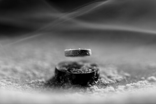 Quantum Levitation, Levitating Neodimium Magnet Withing Mist Produces By Liquid Nirogen on Superconductor Material High-temperature Superconductivity Liquid Nitrogen Refrigerated Ceramic