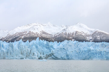 Obraz premium Province of Santa Cruz, Argentina - April 1, 2024: The Perito Moreno Glacier, an Ice Giant at the End of the World, is located in the southern sector of Los Glaciares National Park. 