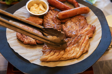 Korean barbecue. pork and sausage