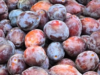 fresh plums at the market