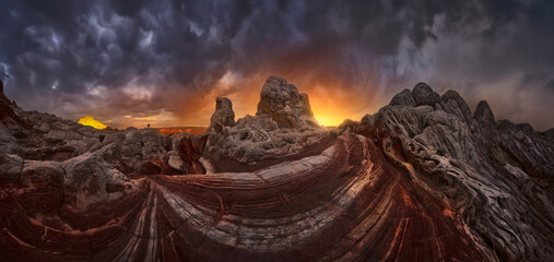 Dramatic sunset over rocky landscape with vibrant colors