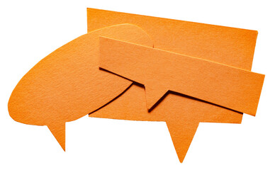 Orange blank cut out cardboard paper speech bubbles with rough edges and copy space for text on...