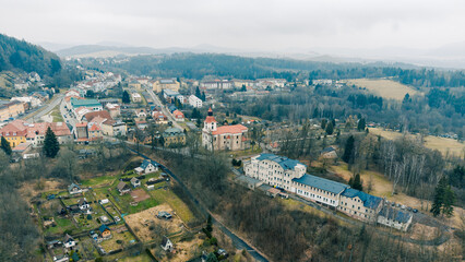 Aerial View of European Village, Houses and Hills. Zacler, Czechia