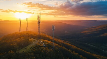 An aerial view of telecom towers set amidst the landscape and mountains in Orange, New South Wales, Australia.