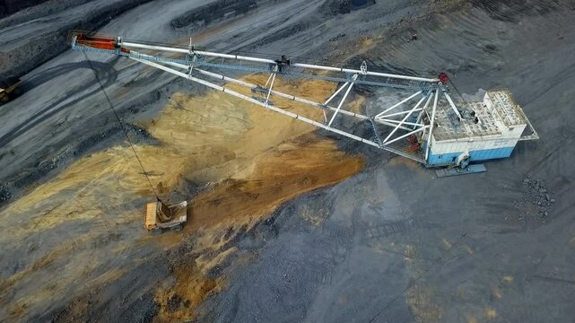 This aerial image shows heavy machinery in mining operations, highlighting large scale activity. Stock Clip