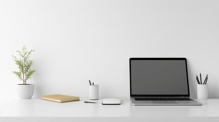 Minimalist Workspace with Laptop, Plant, and Office Supplies