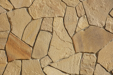 wall lined with flat stones of irregular shape