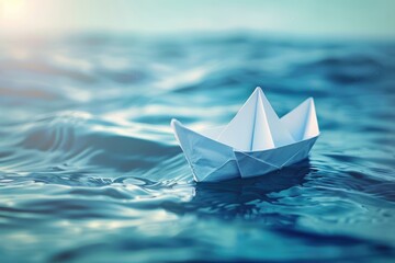 Origami paper boat sailing on beautiful waves.