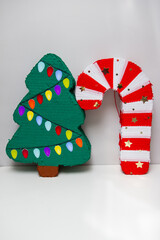 New Year's pinatas with candies Christmas tree and Christmas candy