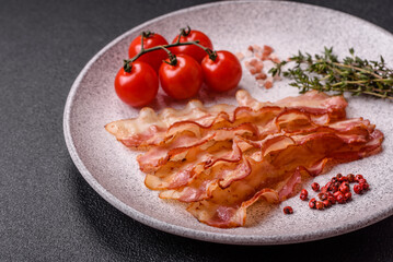 Bacon sliced, grilled with salt and spices