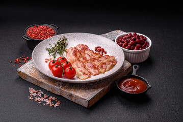 Bacon sliced, grilled with salt and spices