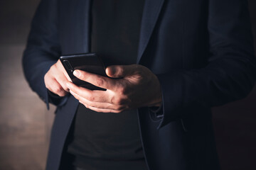 man hand holding smart phone