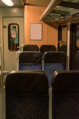 Interior of old vintage train at night. 