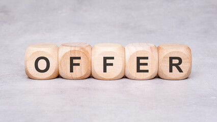 An Enticing Offer Display Featuring Wooden Blocks for Captivating Customers and Marketing