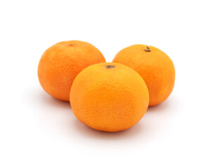 Three fresh tangerines in a cluster on white background