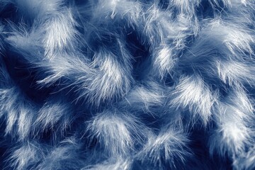 Obraz premium Gentle strands of soft fibers intertwine in a soothing blue palette, evoking a sense of tranquility and warmth ideal for artistic exploration and cozy settings