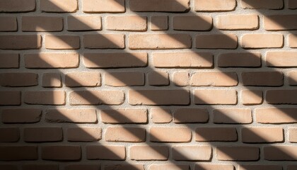 Afternoon light casts shadows over a textured brick wall, creating interesting shapes