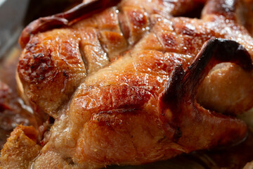 A closeup view of a roasted duck.