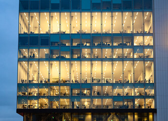 Office with people behind their computer desks