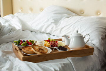 A view of a catered breakfast in bed tray.