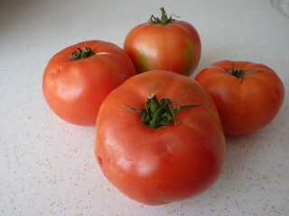 The Essence of Simplicity: A Cluster of Ripe Tomatoes Representing Nature's Abundance and the Cycle of Growth and Nourishment