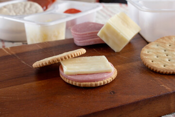 A view of a cracker sandwich building lunch kit.
