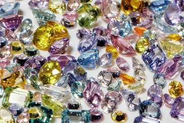 Background made of precious stones. Multi-colored sapphires