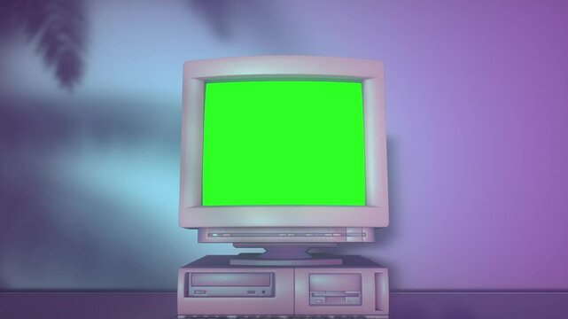 Old Personal Computer with Keyboard on a Desktop with Green Screen