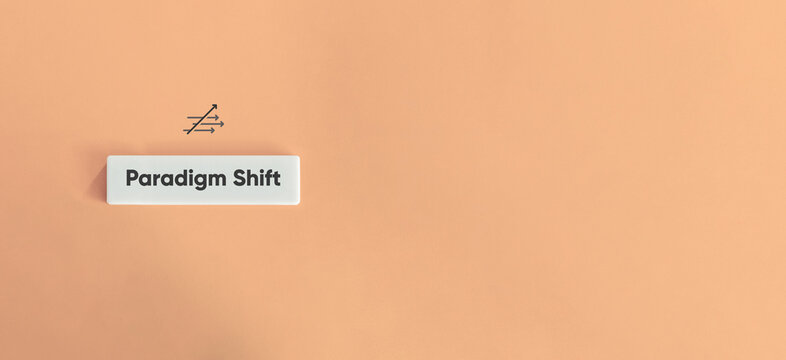 Paradigm Shift Term. Fundamental Change in Approach.
Text on Block Letter Tile on Dusty Pink Background. Minimal Aesthetic.