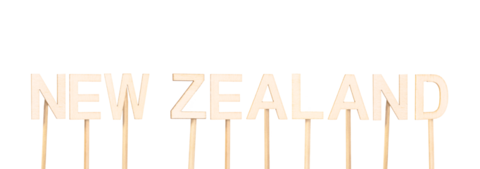 Country name New Zealand in wooden letters on white-transparent background.