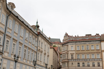 Historic buildings in a beautiful European urban backdrop highlight intricate architectural designs